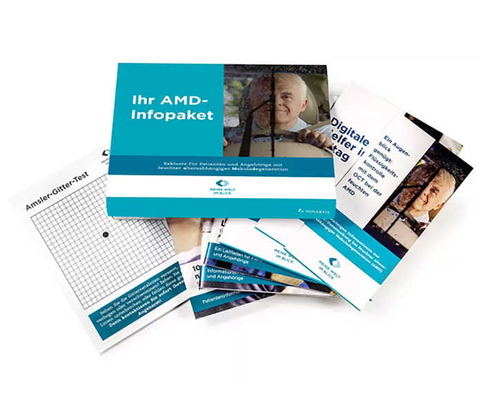 Der Inhalt des Infopakets zur feuchten AMD ausgebreitet.